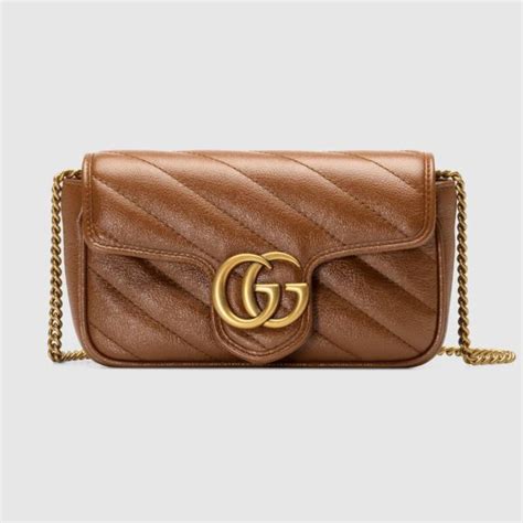 gucci gg 1040 7dj brown|Gucci GG Emblem super mini shoulder bag.